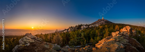 Sunrise over the city of Liberec, Czech republic. Jested. View from the Virive stones Jested Mountain. Jizerske mountains and Liberec. photo