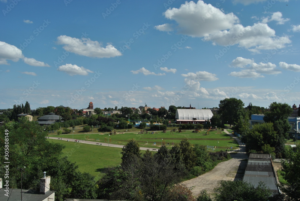 Tczew city, view from the balcony on the church and public outdoor pool, Poland. 