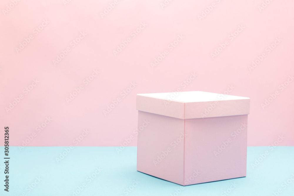 Empty, open white gift box on blue background with copy space Empty, open white gift box on blue background with copy space