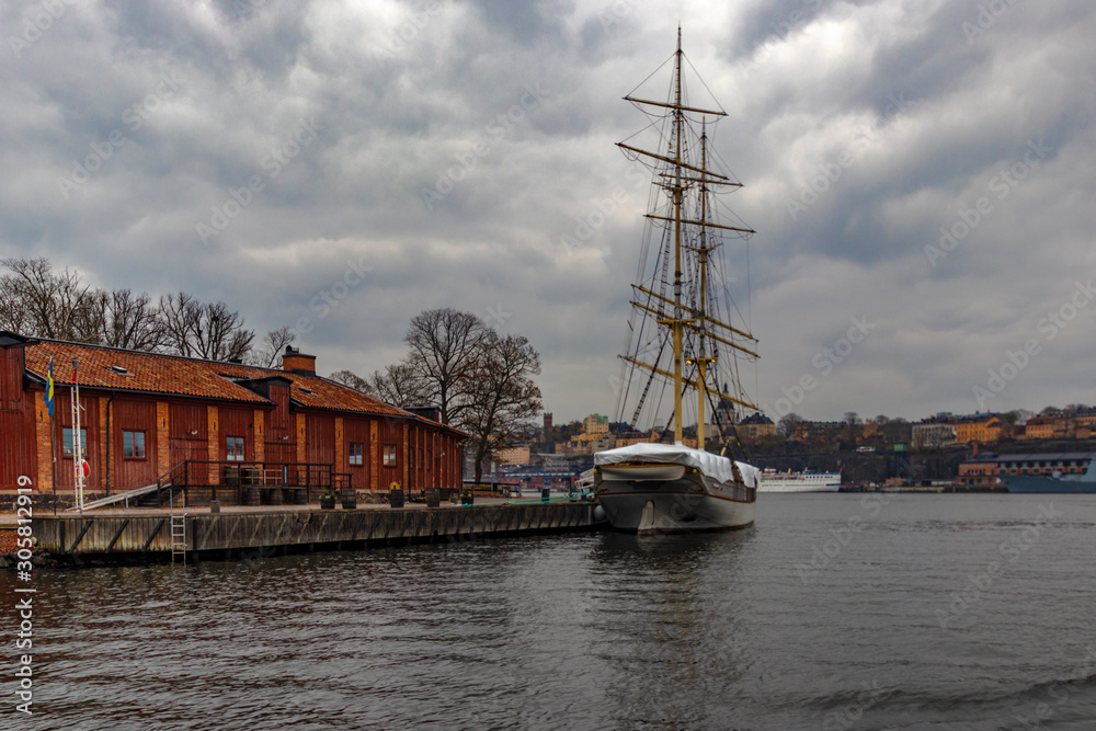 STOCKHOLM, SWEDEN - 2 NOVEMBER 2019: Af Chapman is a full-rigged steel ship moored on the western shore of the islet Skeppsholmen in central Stockholm, Sweden STOCKHOLM, SWEDEN - 2 NOVEMBER 2019: Af Chapman is a full-rigged steel ship moored on the western shore of the islet Skeppsholmen in central Stockholm, Sweden