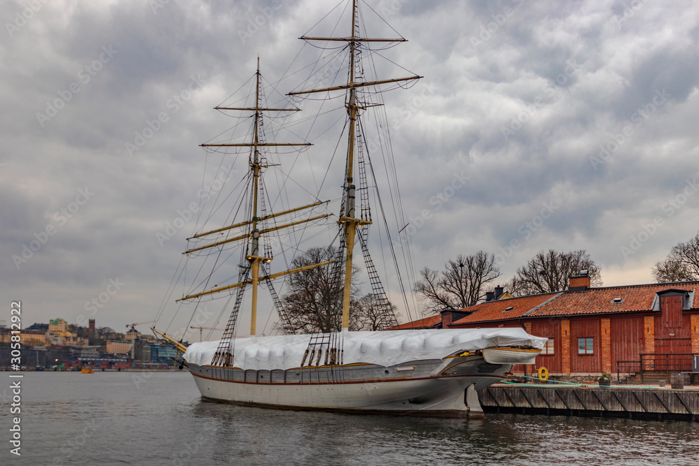 STOCKHOLM, SWEDEN - 2 NOVEMBER 2019: Af Chapman is a full-rigged steel ship moored on the western shore of the islet Skeppsholmen in central Stockholm, Sweden STOCKHOLM, SWEDEN - 2 NOVEMBER 2019: Af Chapman is a full-rigged steel ship moored on the western shore of the islet Skeppsholmen in central Stockholm, Sweden
