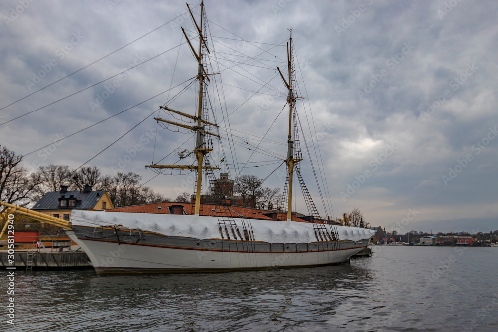 STOCKHOLM, SWEDEN - 2 NOVEMBER 2019: Af Chapman is a full-rigged steel ship moored on the western shore of the islet Skeppsholmen in central Stockholm, Sweden STOCKHOLM, SWEDEN - 2 NOVEMBER 2019: Af Chapman is a full-rigged steel ship moored on the western shore of the islet Skeppsholmen in central Stockholm, Sweden