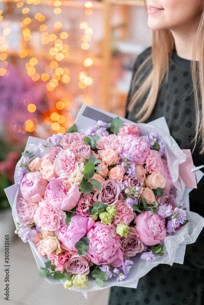 Pink peonies, Sarah Bernhardt and different flowers. European floral