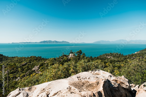 Pristine nature in Magnetic island, Australia, beautiful view on the ocean and green tropical forest below