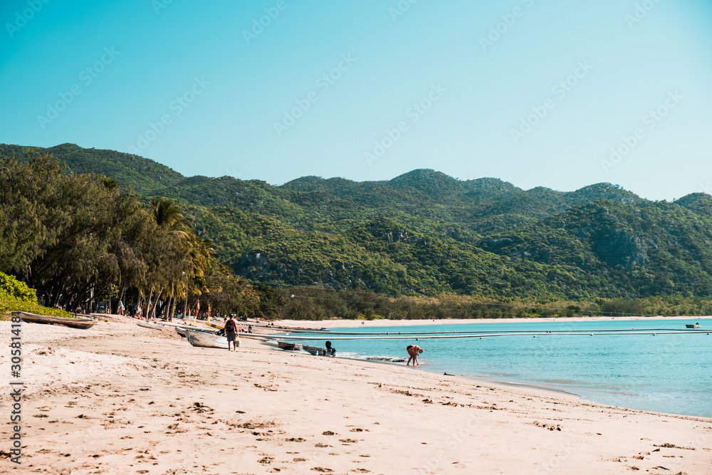 Empty boat on the sandy beach of tropical Magnetic island, Australia