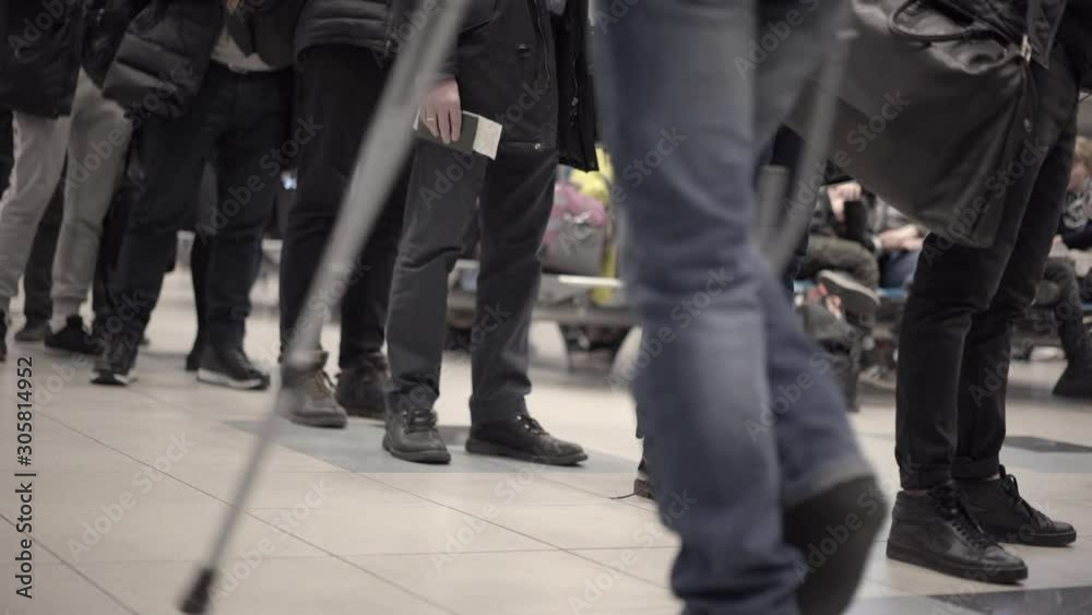 passengers at the airport in line for check-in, waiting for boarding passengers at the airport in line for check-in, waiting for boarding