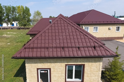 Wallpaper Mural Corrugated metal roof and metal roofing. Modern roof made of met Torontodigital.ca