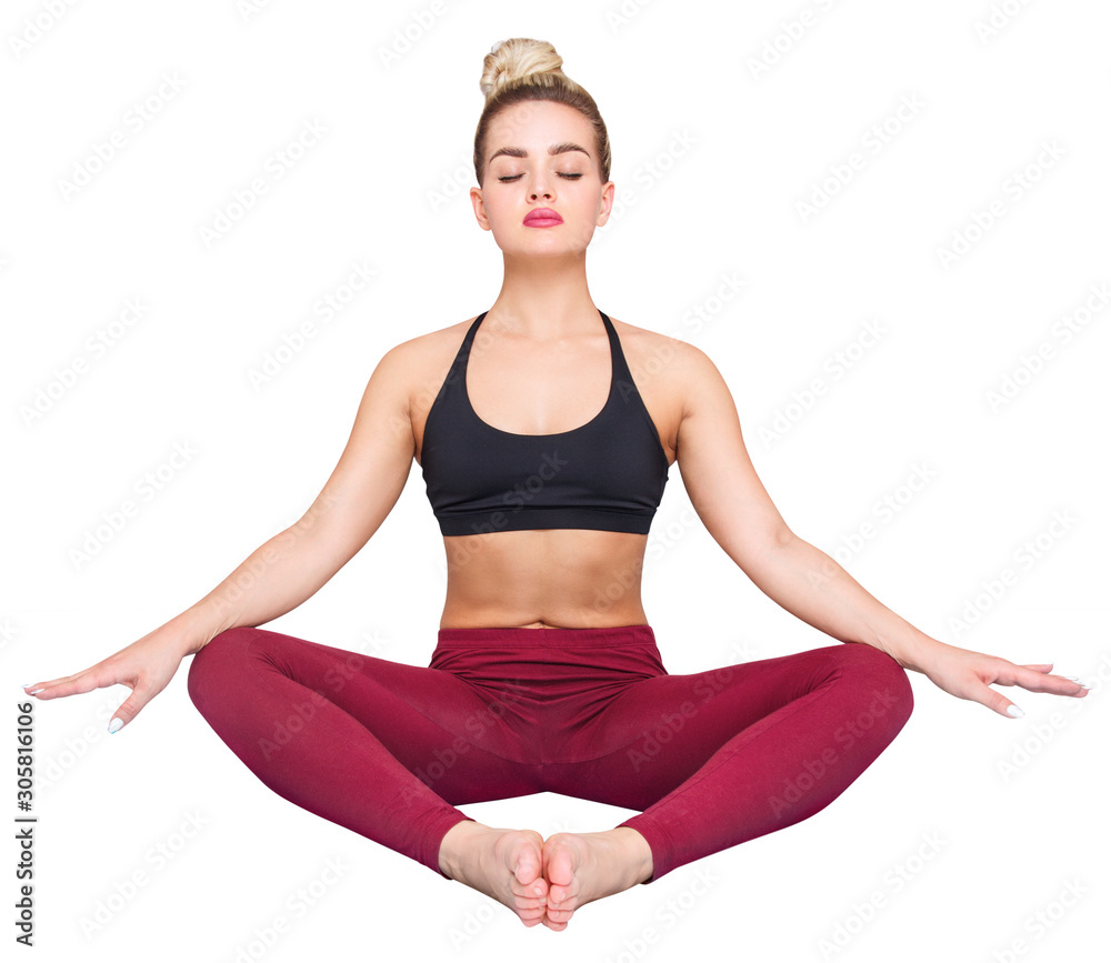 Young beautiful woman sitting in yoga position Young beautiful woman sitting in yoga position