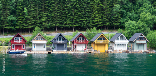 Colorful boat houses along Norwegian Fjord