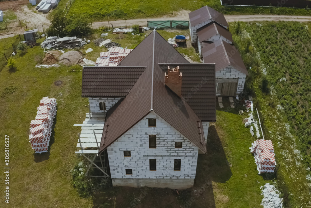 Corrugated metal roof and metal roofing. Modern roof made of met Corrugated metal roof and metal roofing. Modern roof made of met