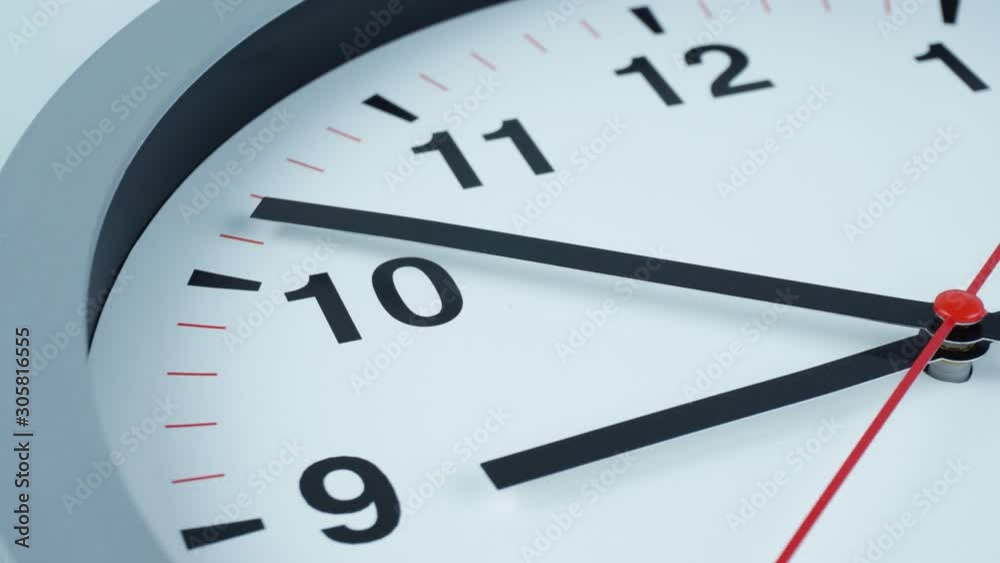 Close up Gray watch beginning of time 08.45 am or pm, Time lapse 30 minutes moving fast on white background. Close up Gray watch beginning of time 08.45 am or pm, Time lapse 30 minutes moving fast on white background.