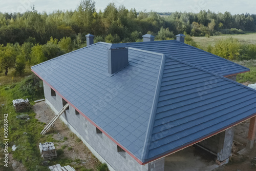 Wallpaper Mural Corrugated metal roof and metal roofing. Modern roof made of met Torontodigital.ca