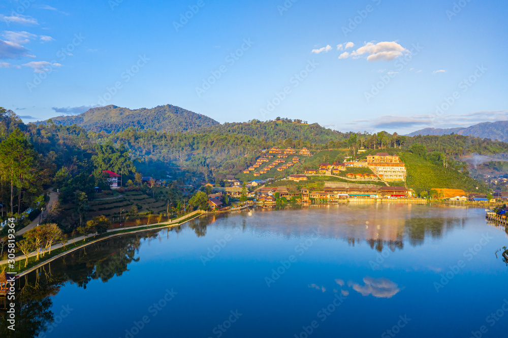 Fototapeta premium Aerial landscape of Ban Rak Thai with sunrise in the morning located in Maehongsan province, Thailand.