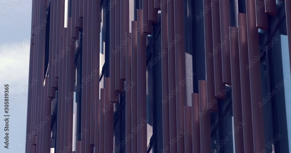 Architectural decision in the design of a modern skyscraper - vertical flat beams in front of windows Architectural decision in the design of a modern skyscraper - vertical flat beams in front of windows