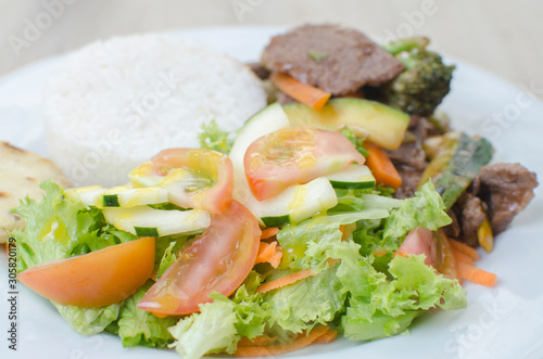 space rice with meat and natural salad