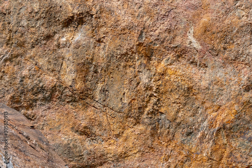 A rockwall background of redsandstone photo