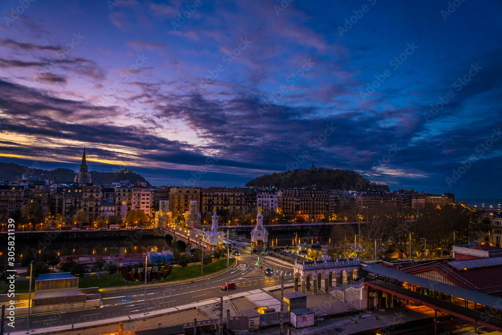 Views of the city of San Sebastián in a sunset on the Urumea River. Basque Country
