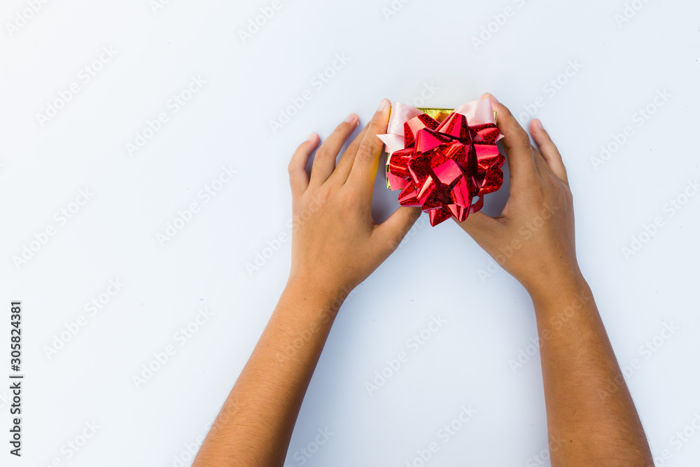 gift in hand isolated on white background