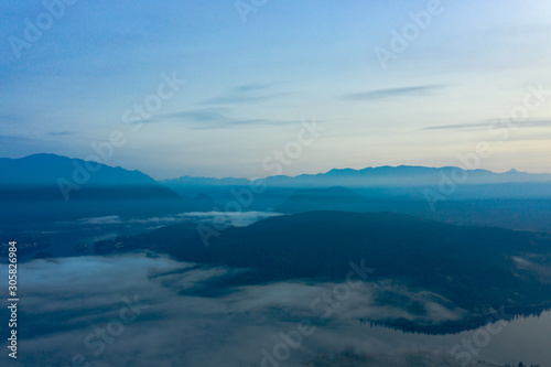 Sunrise taken above the forest of the Indian Arm  Vancouver  BC.