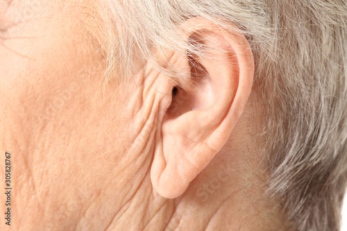 Senior woman with hearing p...