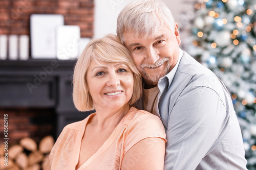 Happy mature couple on Chri...
