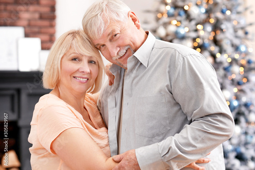 Happy mature couple on Chri...