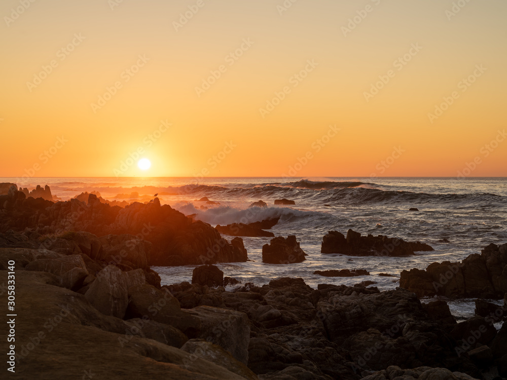 Sunset on the beach near Monterey Bay California.