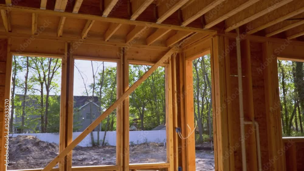 Interior framing beam of new house under construction home framing beam construction Interior framing beam of new house under construction home framing beam construction