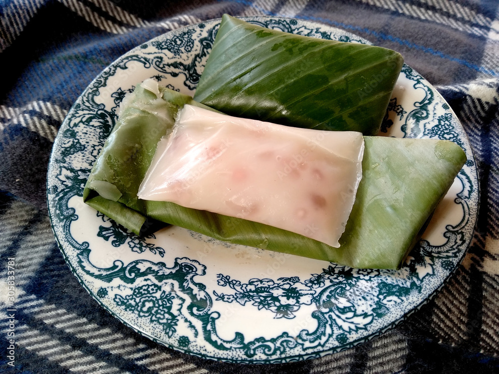 Kue basah khas bali or Balinese specialty cakes. cake wrapped in banana ...