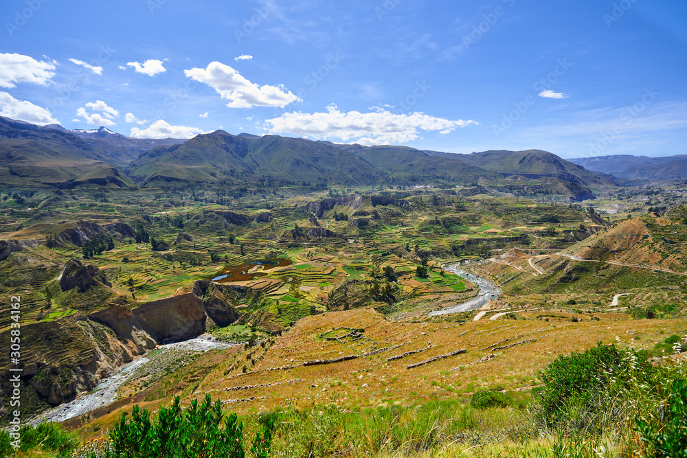 Obraz premium Terraces on the Colca River. In the background the birth of the Amazon River in the Cordillera Chila, on the slopes of the Mismi, in Arequipa, Peru