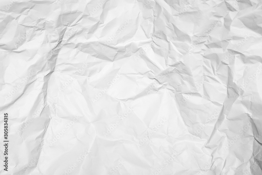 Fototapeta premium White crumpled paper texture background. 