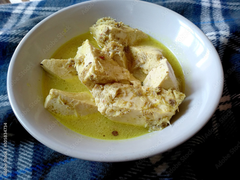 Traditional indonesian culinary food. Tahu Kuah Santan or tofu and Coconut Curry Soup. Tahu Kuah Santan Indonesian Food that is simple and often made at home. Indonesian Street Food. Traditional indonesian culinary food. Tahu Kuah Santan or tofu and Coconut Curry Soup. Tahu Kuah Santan Indonesian Food that is simple and often made at home. Indonesian Street Food.