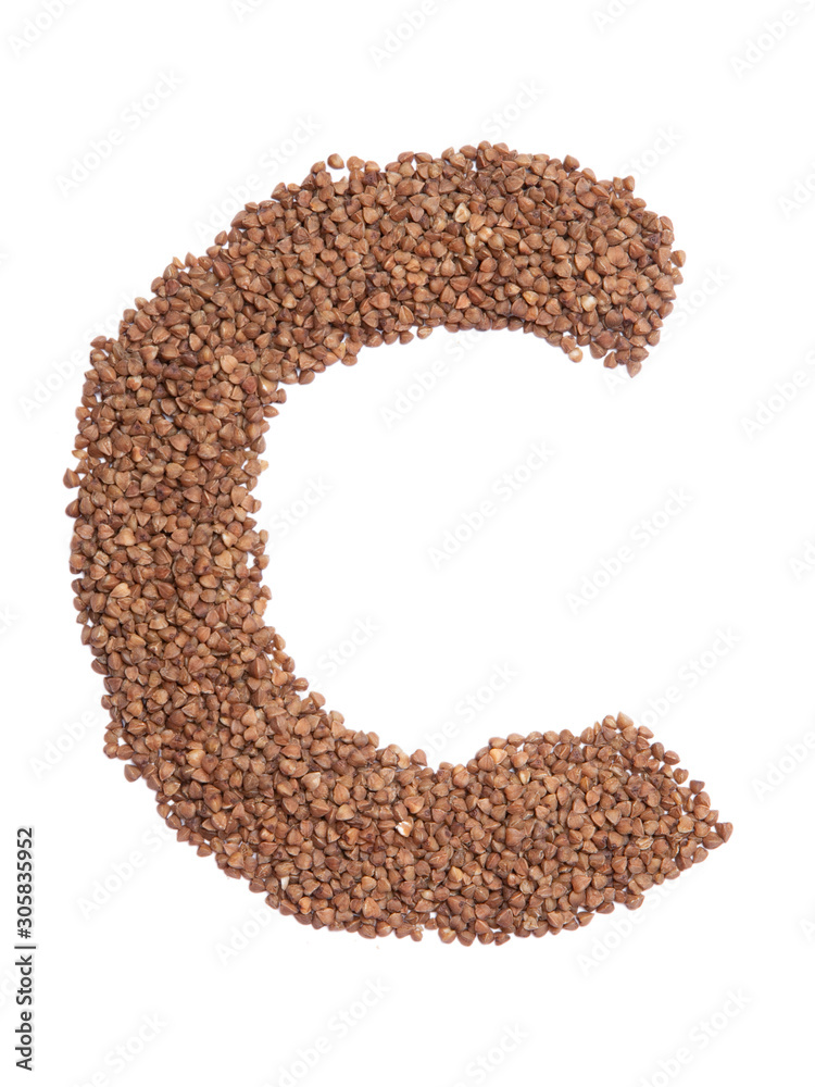 Letter C of the English alphabet from  brown dry buckwheat  on a white isolated background. Food pattern made from groats. Bright alphabet for shops.  Buckwheat for porridge