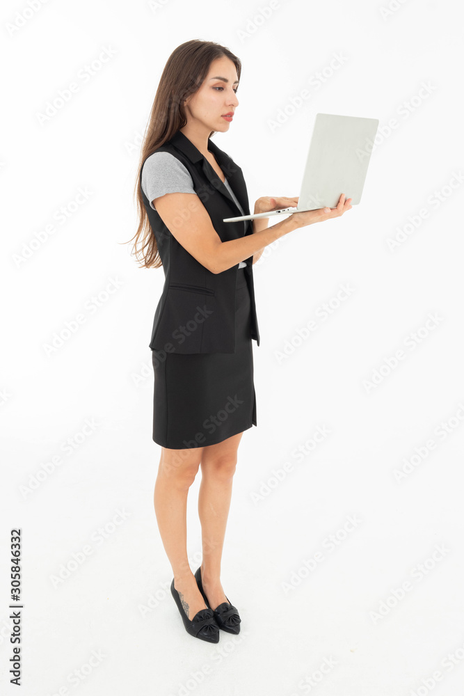 Women dressed in skirts and T-shirts and waistcoats Wear shoes Standing, carrying a white or gray notebook To do business Communicate with colleagues And various technological work Women dressed in skirts and T-shirts and waistcoats Wear shoes Standing, carrying a white or gray notebook To do business Communicate with colleagues And various technological work