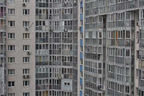 Residential apartments with balconies in a multi-storey building, residential skyscraper