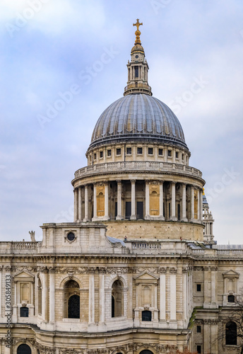 View of the dome of the famous St. Paul's Cathedral in city center on a cloudy day in London, England