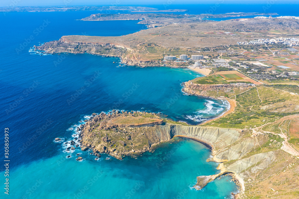 Gnejna and Ghajn Tuffieha bay on Malta island. Aerial view from the height of the coastlinescenic sliffs near the mediterranean turquoise water sea.