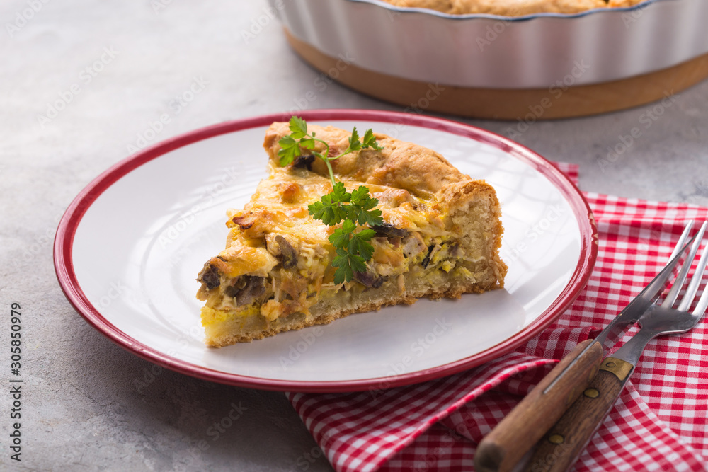 Slice of Pot pie. Individual open chicken mushroom tart  with puff pastry crust. top view