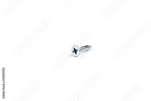 Metal screw for wood on white background. Isolate