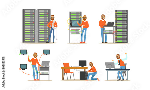 Man Engineer Working in Server Room. Digital Computer Center and Data Support