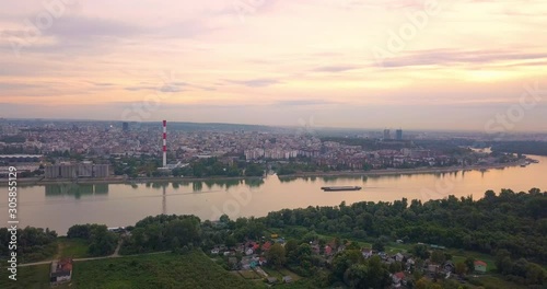 Aerial view of Danube river and a passing cargo ship photo