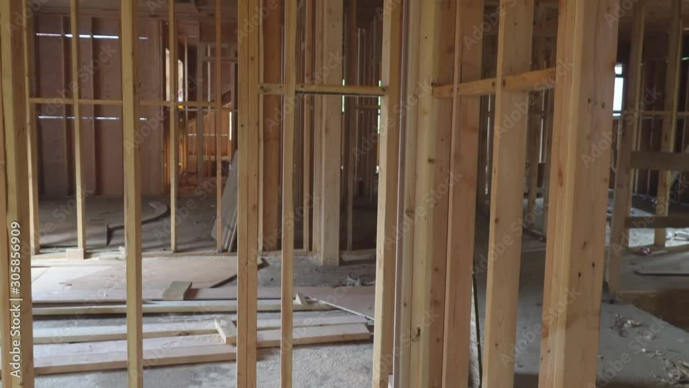 Timber frame house, real estate. stick built home under construction build with wooden truss, post and beam framework. Timber frame house, real estate. stick built home under construction build with wooden truss, post and beam framework.