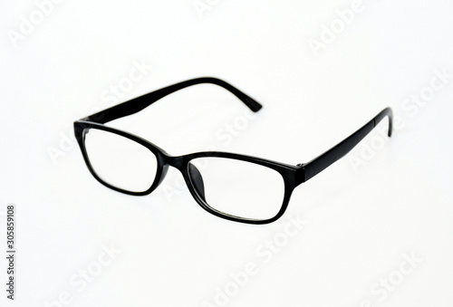 Object eyelglass, square eyewear in black frame on white background isolated .Accessory important for eye's problem people as myopia-nearsightedness or presbyopia (Farsightedness). eyeglass model. photo