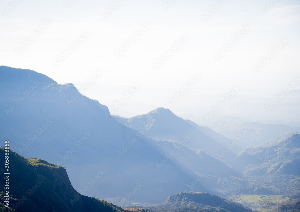 Morning sun rolling over the mountains of Timor Leste