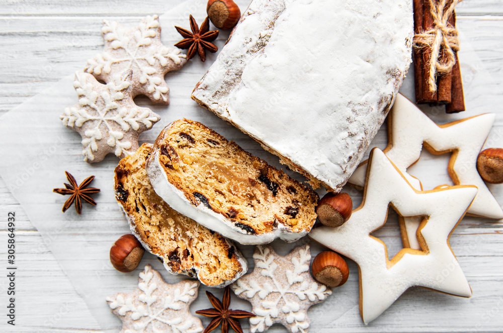 Christmas stollen on wooden background Christmas stollen on wooden background