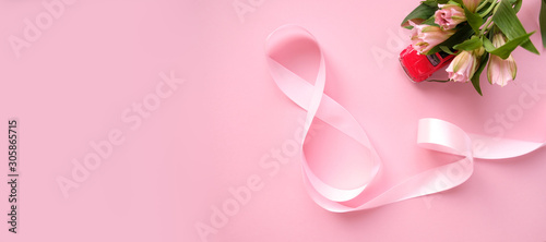 Pink ribbon in the shape of a eight