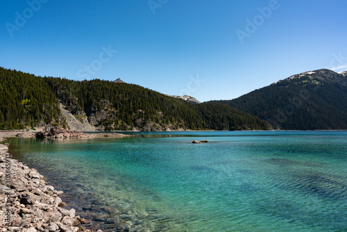 Turquoise coloured lake, clear water in the lake. Garibaldi provincial park, BC, Canada