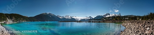 Panoramic view of mountains and turquoise coloured lake in Garibaldi provincial park  BC  Canada