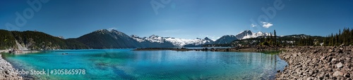 Panoramic view of mountains and turquoise coloured lake in Garibaldi provincial park, BC, Canada