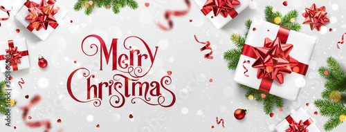 Red Christmas and New Year Text on Xmas background with gift boxes, fir branches, red ribbon, decoration, sparkles, confetti, bokeh. Merry Christmas card. Vector Illustration, realistic vector